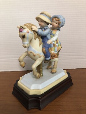 Vintage Holly Hobbie on the Carousel Retired Numbered on Attached Base Nice