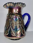 Butterfly and Fern Blue Carnival Glass Pitcher
