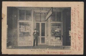 Postcard-DE-LAND-Florida-FL-F-G-Brill-General-Store-Owner-at-Door-1906