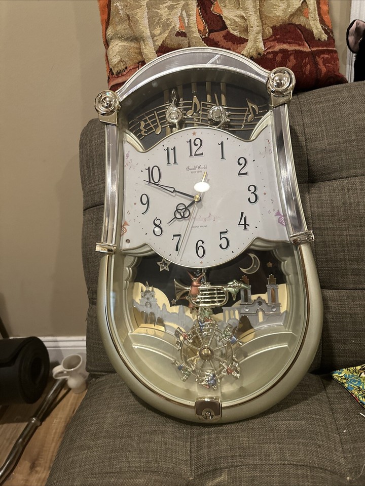 Small World Rhythm Wall Clock 4MH774. Plays Music, lights & Sounds On