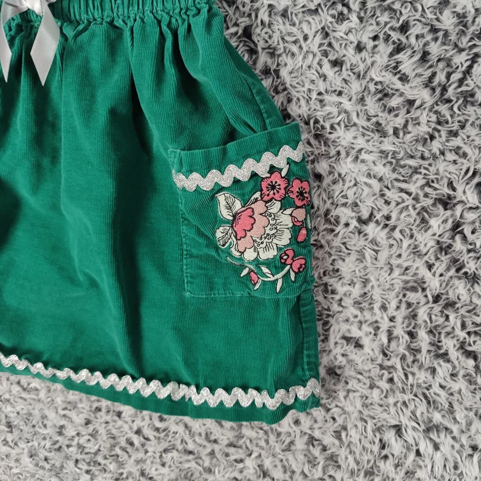 Falda Pana Niña HANNA DIFFERENTSON Talla 110 EE. UU. 5 Floral Bordada Borde Plateado Foto 3 de 4