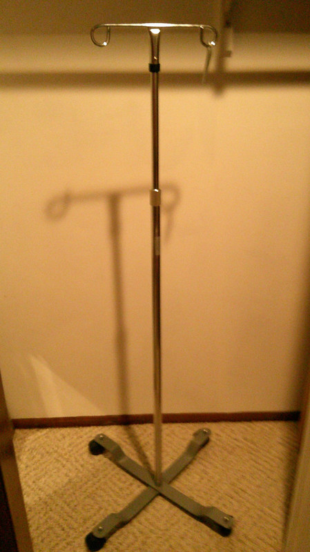 IV pole infusion stand. 2-Hook 4-Leg Chrome Rolling wheels