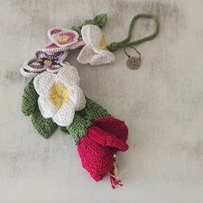The SAK Knitted Handcrafted Crochet Floral Handbag Charm Accent Red White