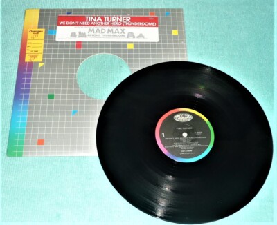 VINYL 12'' - 33 1/3 RPM SINGLE by TINA TURNER ''WE DON'T NEED ANOTHER HERO'' (1985)
