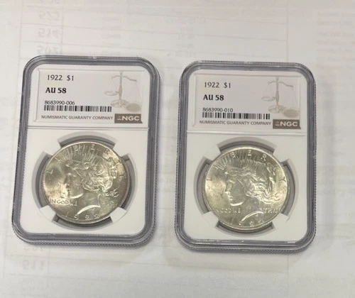 (2) 1922 AU 58 NCG Peace Silver Dollar 90% Silver Coins