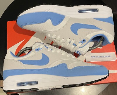 white and baby blue nike tns