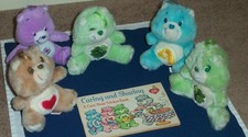 Five plush Care Bear figures and a book