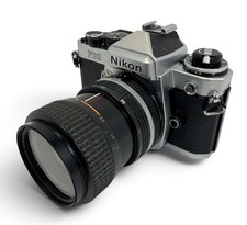 NIKON FE2 SILVER 35MM SLR FILM CAMERA W/ NIKKOR 35-70MM F/3.3-4.5 LENS UNTESTED