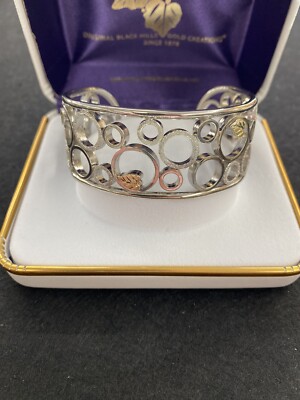 Black Hills Gold sterling silver and gold bracelet by Landstroms, please 