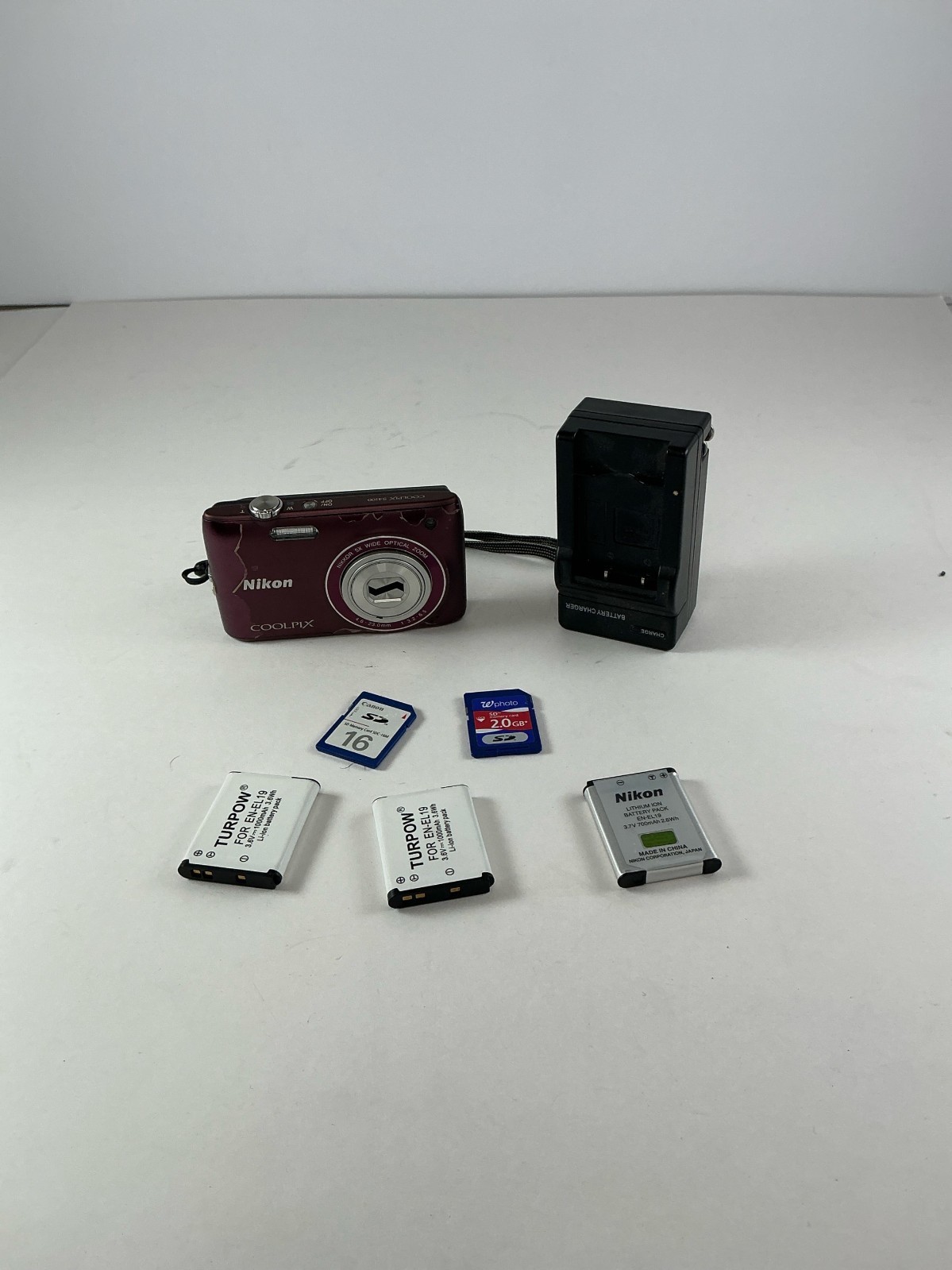 Nikon COOLPIX S4100 14.0MP Digital Camera - Plum Bundle (Charger, Batteries, SD)