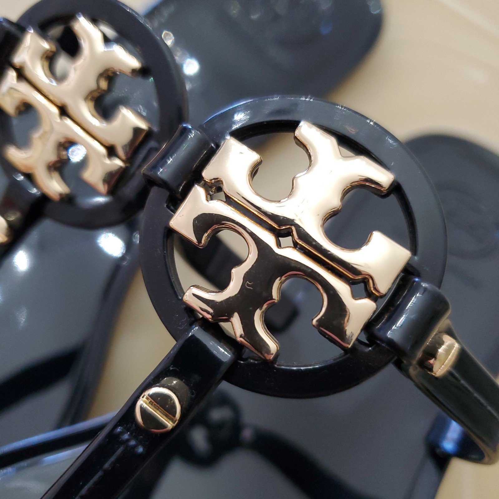 Tory Burch Miller Jelly Thong Sandal in Black with Gold-toned Logo Medallion 8 thumbnail 5