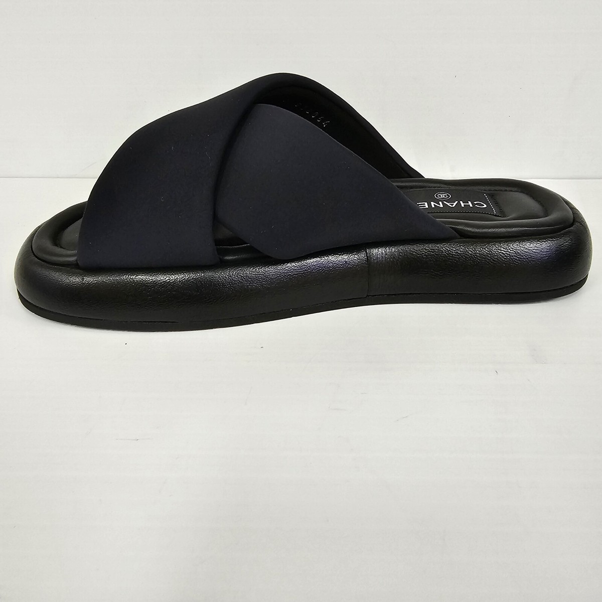 Chanel 23S G38864 Black Criss Cross Puffy CC Logo Slide Mule Chanel 23S G38864 Black Criss Cross Puffy CC Logo Slide Mule