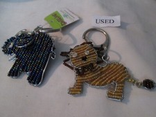 LOT OF 2 BEADED ANIMAL KEYCHAINS ELEPHANT LION