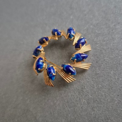 Vintage-Brosche mit blauen Steinen   Eleganz im Retro-Stil