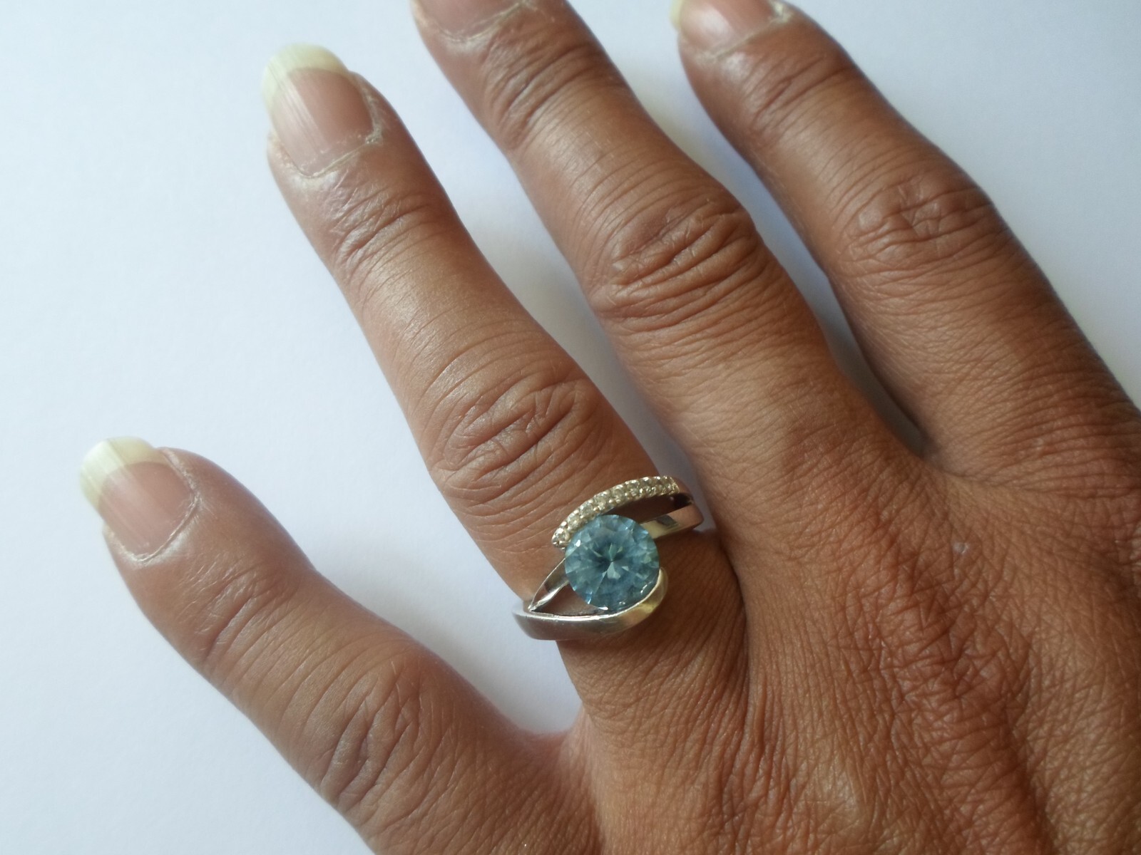 solid silver ring, faceted blue colored stone, zi… - image 1