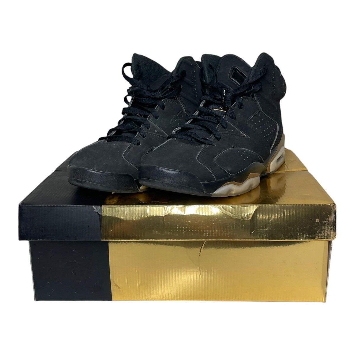 black and gold jordans dmp