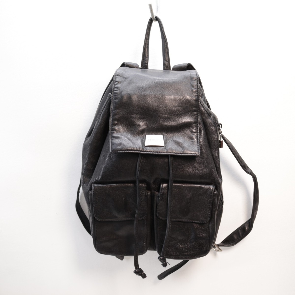 Vintage Perlina backpack leather black drawstring closer and 