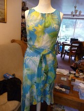 Abito float romano azzurro e verde orlo asimmetrico taglia 10