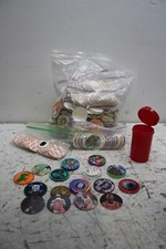 LOT OF 600 VINTAGE POGS WITH PLASTIC AND METAL SLAMMERS  