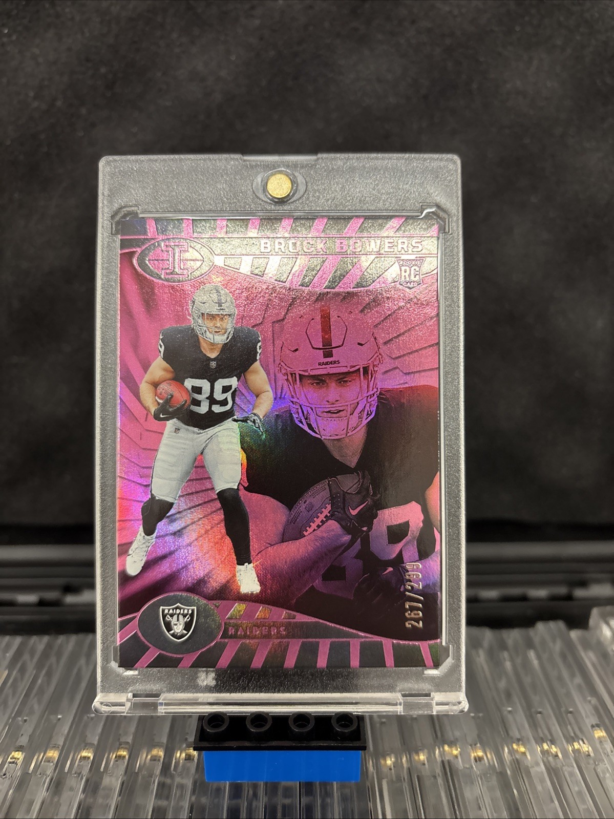 2024 Panini Illusions - Brock Bowers #47 Trophy Collection Pink /299 (RC)