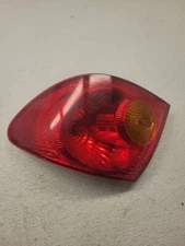 Toyota Corolla Passenger Tail Light Quarter Panel Mounted 2003 2004 OEM