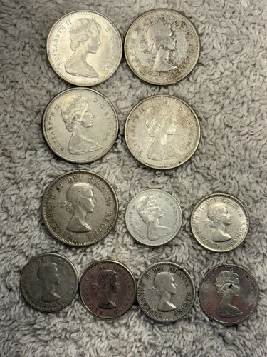 (lot of 11)  Canada Silver Dimes & Quarters - 80% Silver (1.11 troy Oz)