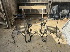 WROUGH IRON TABLE AND CHAIRS