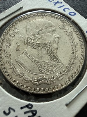 This Item Is A 1966 Mexican One Peso Coin Featured In A Coin Holder