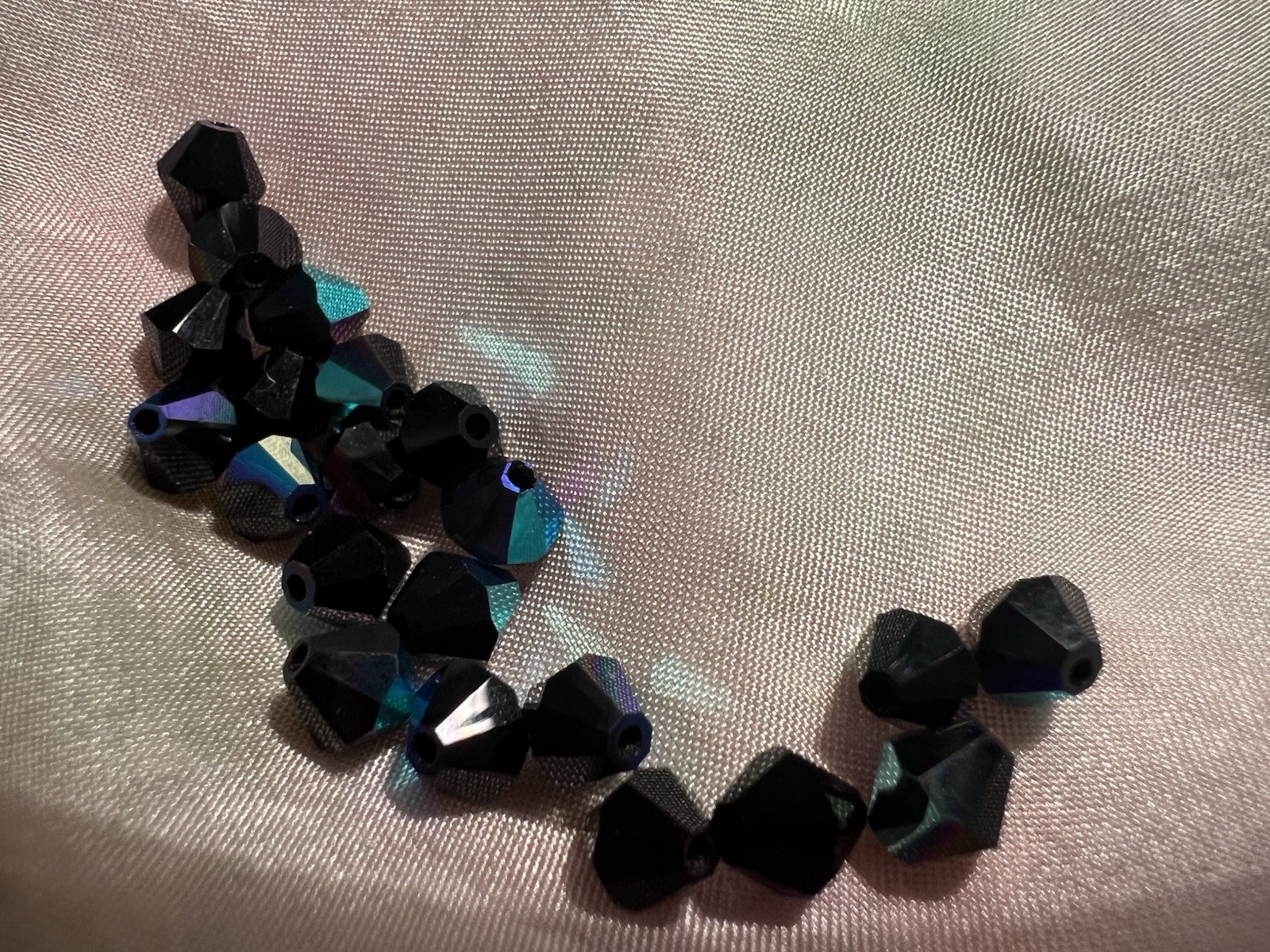￼ Swarovski Faceted Beads. 5mm Bicone. First Quality. Jet AB Color