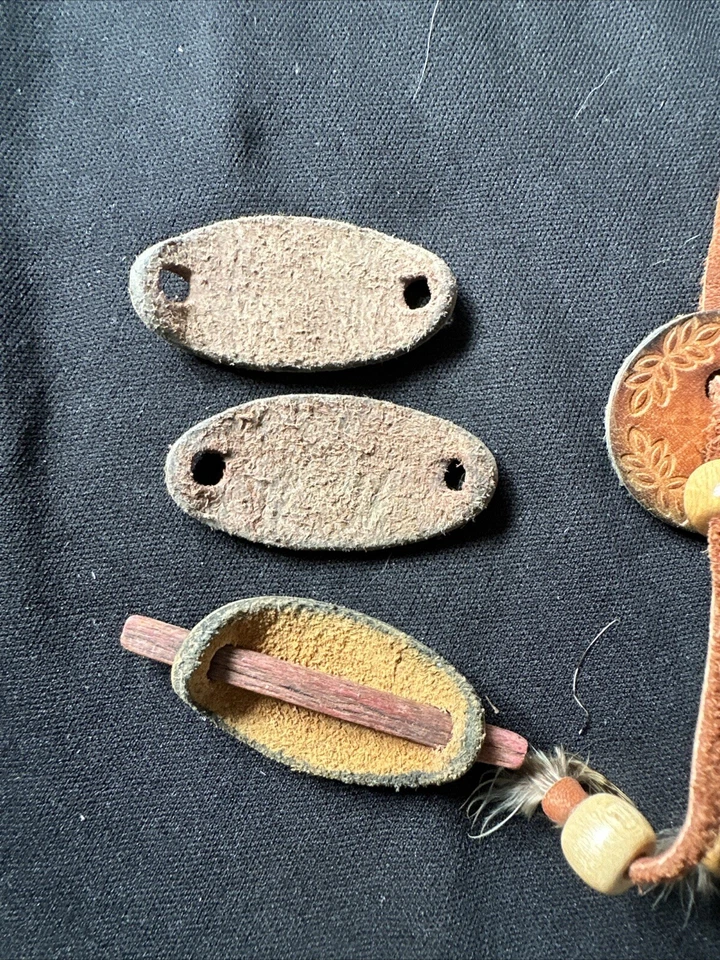 Correas para el cabello de cuero con palos y trabillas para el cabello de cuero Foto 3 de 4