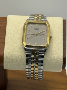 Citizen 1000-S63871 Cuarzo Delgado Rectángulo Tanque Reloj Fecha Dos Tonos Hombre Funciona