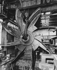 Crane lifts a 21 foot fan which will be used in the ventilating sy- Old Photo