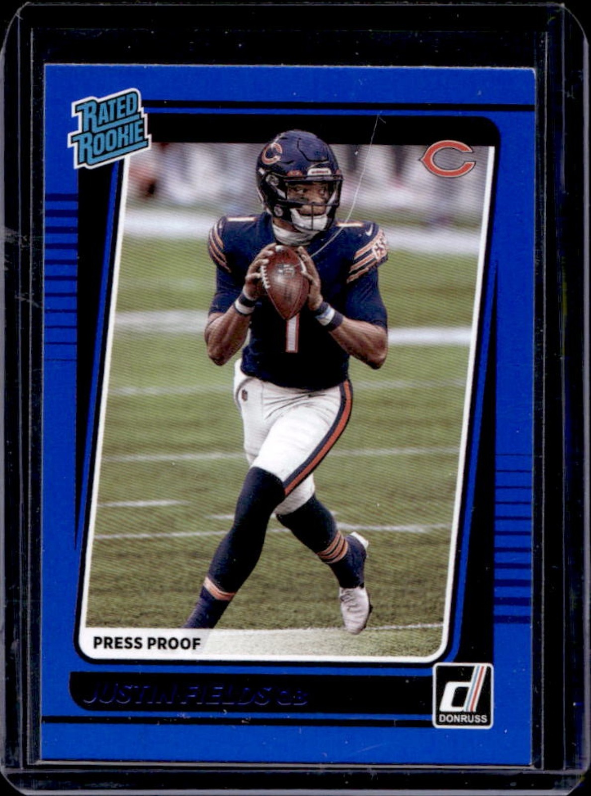 2021 Donruss Justin Fields Press Proof Blue Rated Rookie #253 Bears