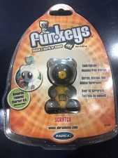 U.B. FUNKEYS RARE SCRATCH GREY  YELLOW 2007 NEW IN SEALED PACKAGE M1636