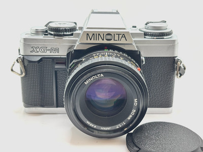 Minolta XG-M 35 mm Camera and 50 mm lens plus vintage strap  (Film Tested )