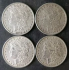 One 1879 and Three 1880 $1 Morgan Silver Dollars