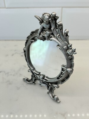 Antique 6  Cast Iron Mirror with Swing Arm Stand & Cherub On Top