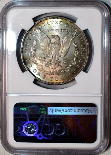 NGC MS-63 1885-P Morgan Silver Dollar, Blazing, Iridescent Rainbow Toner.