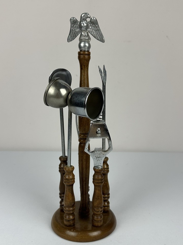 A vintage wooden bar tool set crowned with a pewter eagle — patriotic, functional, and zero percent IKEA.