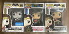 Three Wonder Woman Pop Vinyl Figures: #86, #86 WalMart Variant, #172 in blue/red suits with accessories.