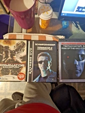 3 terminator dvds / 2 almost new & 1 good former blockbuster rental
