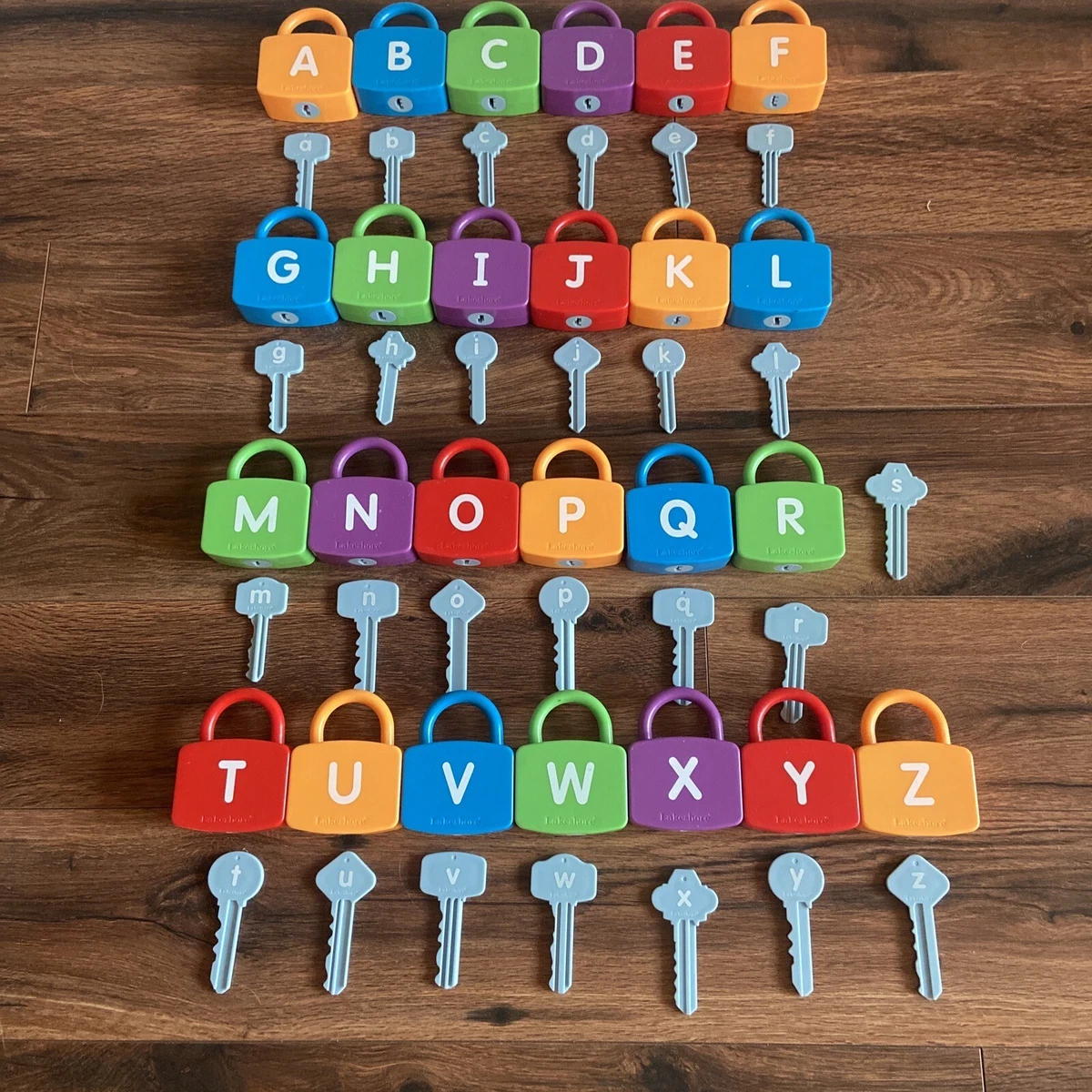 Alphabet lock outlet and key toy