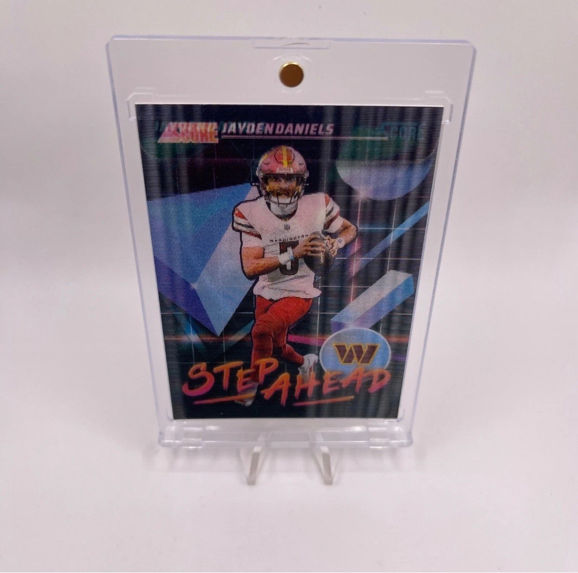 2025 PANINI SCORE JAYDEN DANIELS STEP AHEAD CASE HIT COMMANDERS. ROY SA-JDS