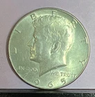 1965 Philadelphia mint kennedy 40% silver half dollar AU