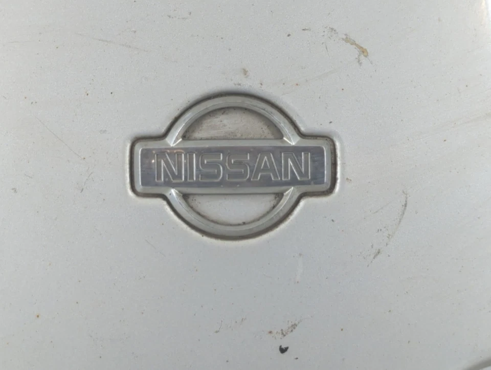 Cubierta de rueda tapacubos Nissan Altima 1994 OEM Foto 2 de 4