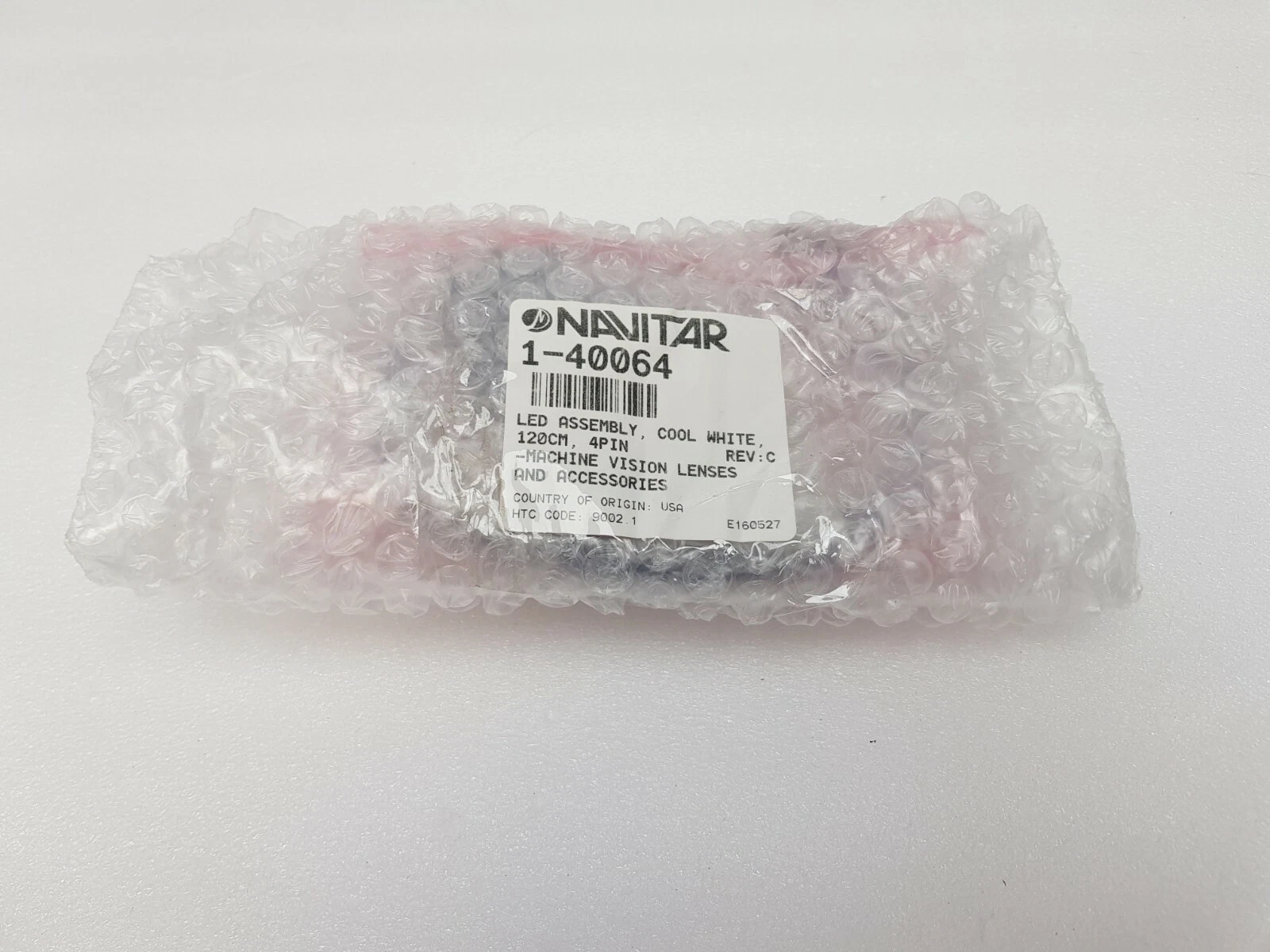 Navitar 1-40064 LED assembly in bubble wrap with the Navitar part label