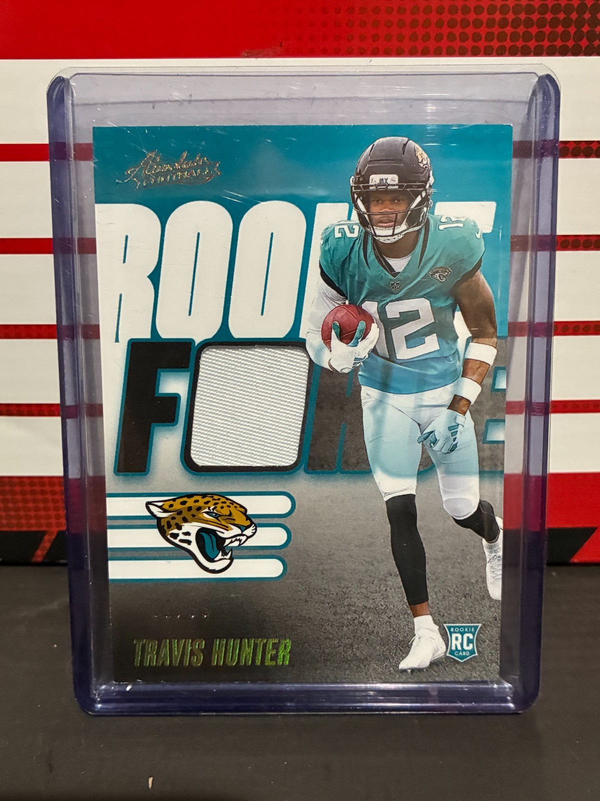 TRAVIS HUNTER 2025 PANINI ABSOLUTE ROOKIE FORCE JERSEY PATCH RC FIRST 1 #1/99