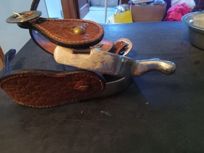used Western humane spurs with straps