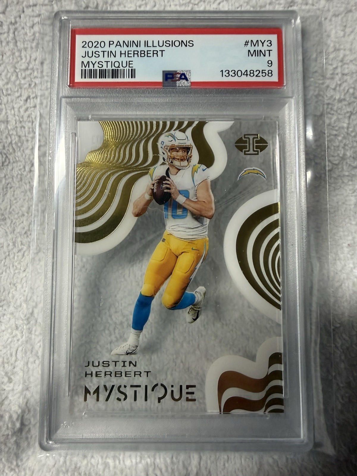2020 Panini Illusions - Mystique Justin Herbert #MY3 (RC) psa9