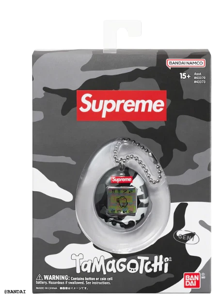 Porte clés noir Supreme Tamagotchi SS23 épuisé Bandai Japon à la main